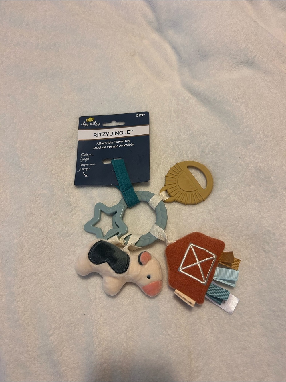 Itzy Ritzy Ritzy Jingle Travel Toy - Teal, Rust & Mustard Barnyard